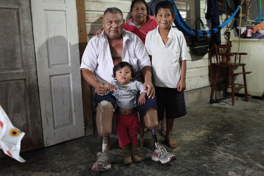 Doroteo Correa (left), poses with his wife Arsenia Petch and two of his grandchildren
